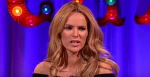 Amanda Holden Mimics Bond Girl In Tiny Black Bikini