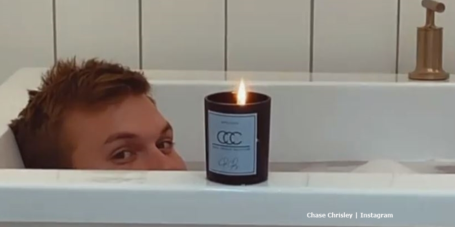 Chase Chrisley with his collection candle