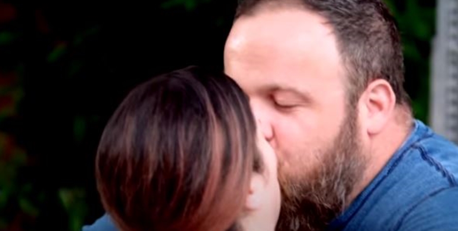 Whitney Way Thore and Buddy Bell kiss