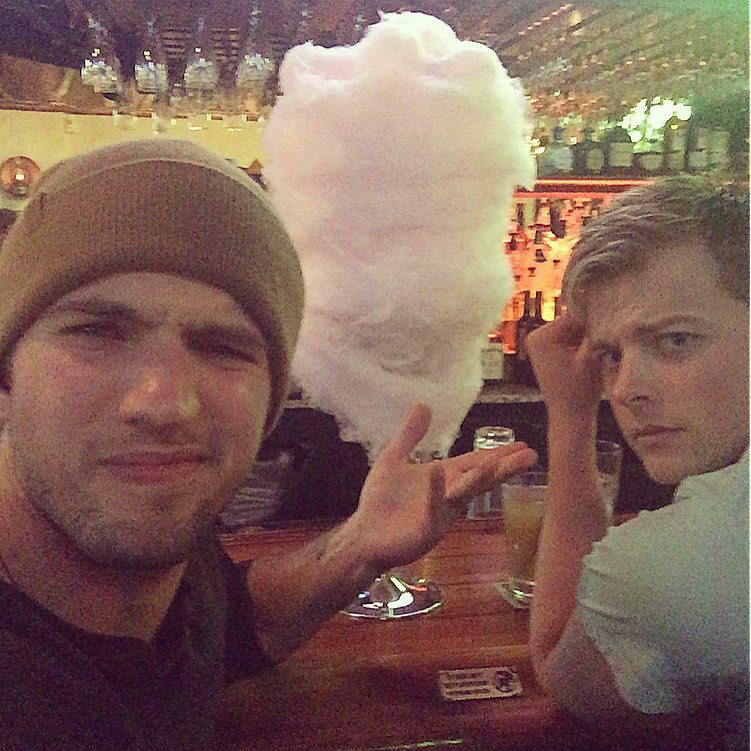 Two men and a ball of cotton candy