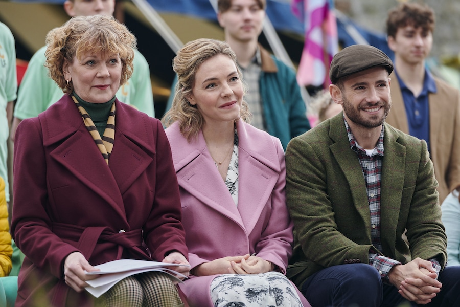 Hallmark Photo: Samantha Bond, Eloise Mumford, Julian Morris Credit: ©2022 Crown Media United States LLC/Photographer: Craig Hardie