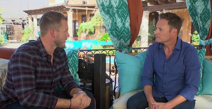 Two men sitting on a couch 