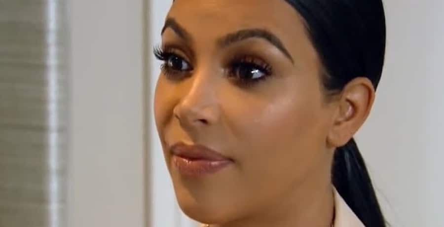 Kim Kardashian Showcases Slender Waist With White Crop Top [Credit: YouTube]