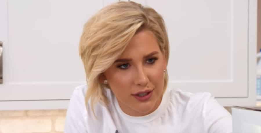 Savannah Chrisley Rocks Sporty Glam Look In Striped Bikini [USA Network | YouTube]