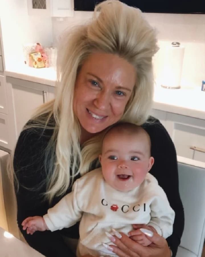 Theresa Caputo Holds Baby Michelina [Theresa Caputo | Instagram]