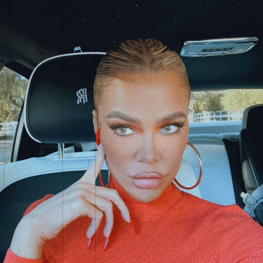 Khloe Kardashian Wears Orange Turtleneck [Khloe Kardashian | Instagram]