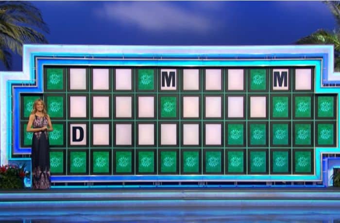 Vanna White on Wheel of Fortune- YouTube/Wheel of Fortune- Wheel of Fortune Gets A New Board