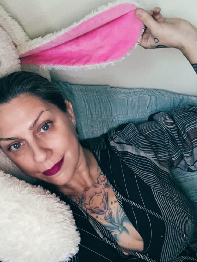 Danielle Colby Holds Stuffed Bunny [Danielle Colby | Patreon]