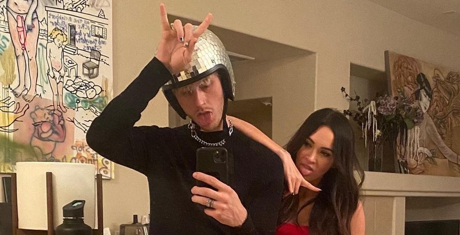 Machine Gun Kelly and Megan Fox snap a silly couple's selfie.