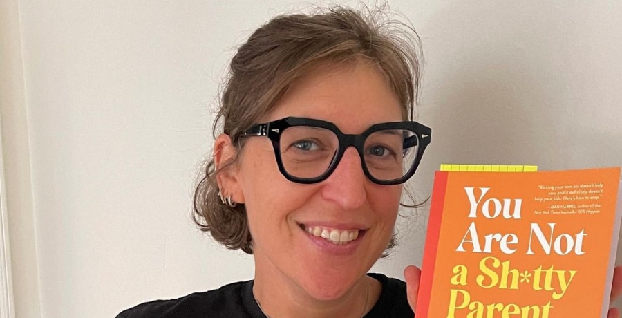 Mayim Bialik Holds Book [Mayim Bialik | Instagram]