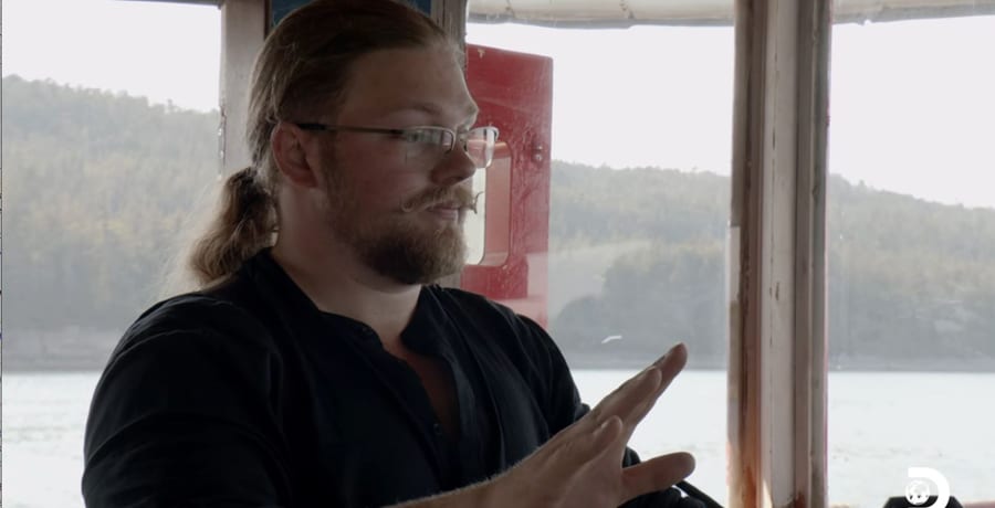Noah Brown on a boat | episode screencap