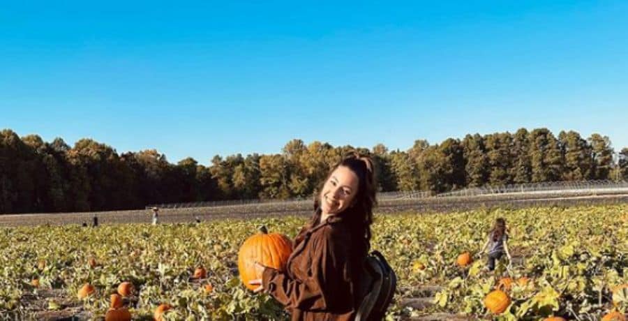 Vee Rivera in a pumpkin patch - Instagram/Vee Rivera