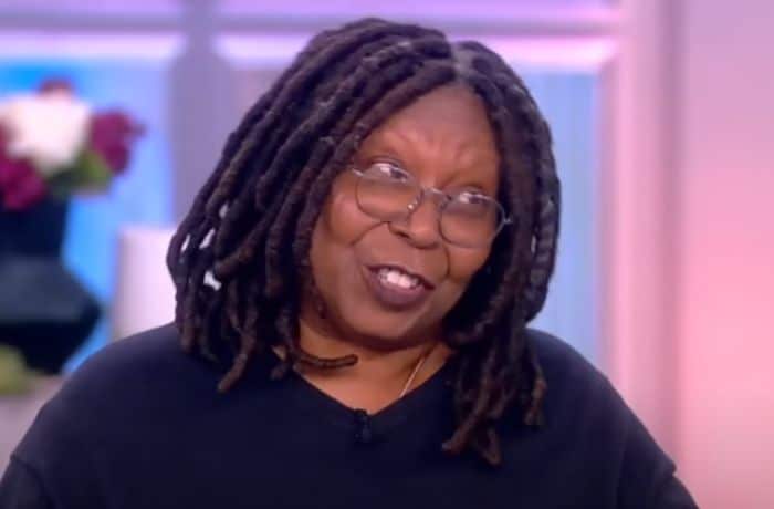 Whoopi Goldberg looking skeptical during discussion on 'The View' - YouTube/The View