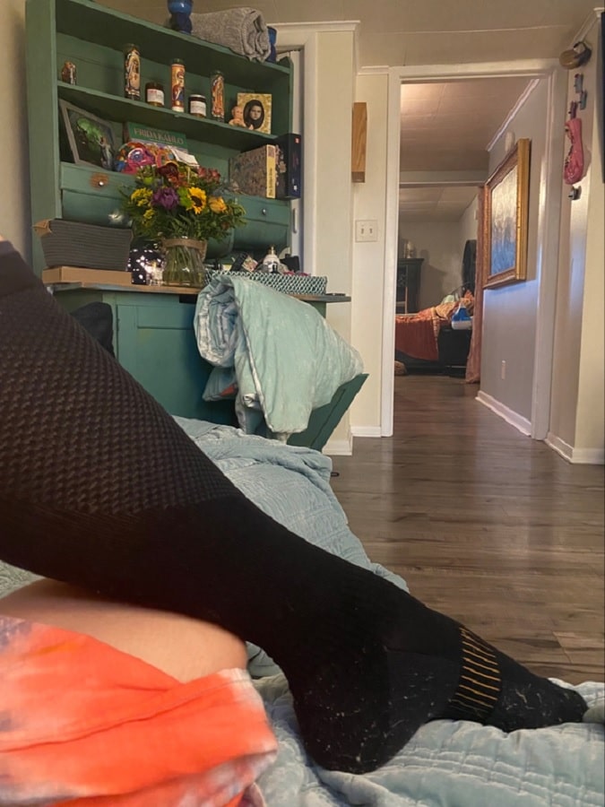 Danielle Colby Wears Compression Socks [Danielle Colby | Patreon]