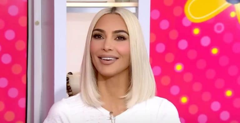 Kim Kardashian Nearly Spills Out Of Tiny Silver Top