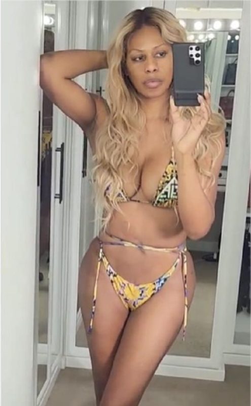 Laverne Cox snaps a mirror selfie in string bikini.