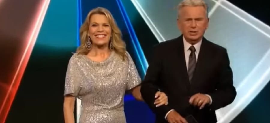 Vanna White Dazzles Pat Sajak In Silver Dress [ARG Music Company | YouTube]