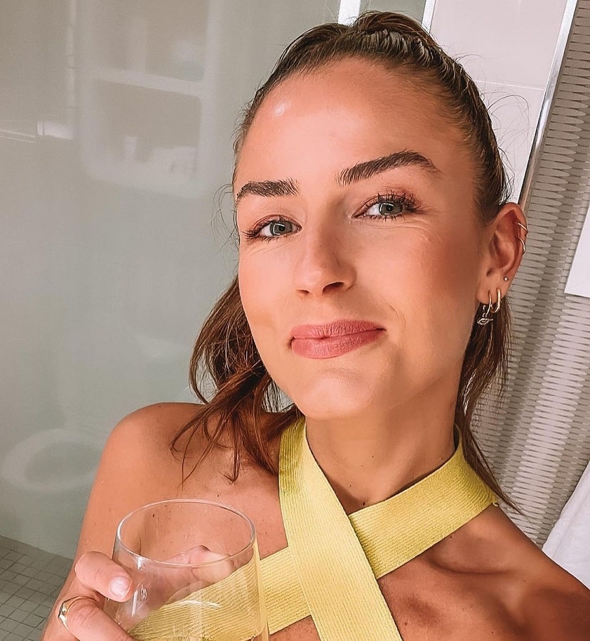 Aesha Wears Yellow Halter Top & High Ponytail [Aesha Scott | Instagram]