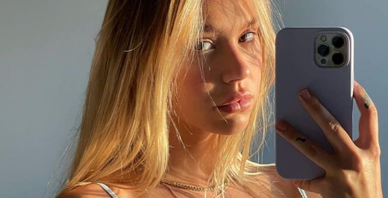 Alexis Ren Teases Fans With Plunging Neckline