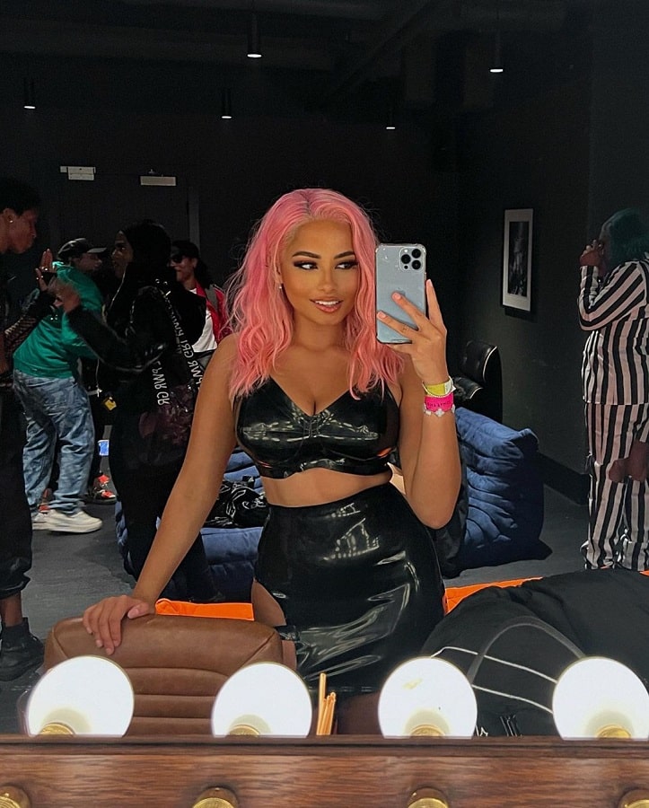 Amber Gill Poses In Pink Wig & Black Sexy Dres [Amber Gill | Instagram]