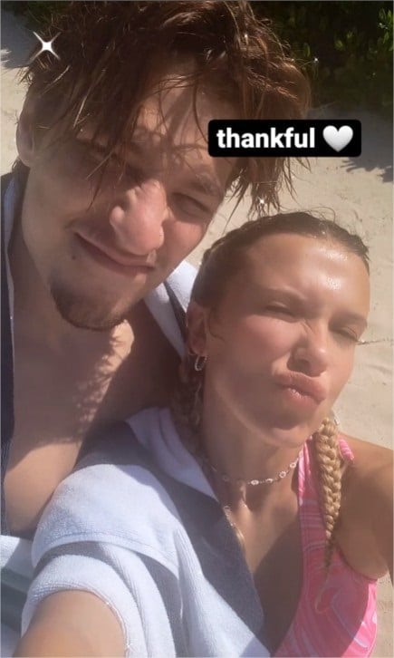 Millie Bobby Brown snaps a bikini selfie with boyfriend Jake Bongiovi.