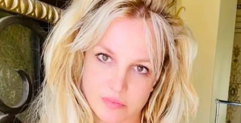 Playful Britney Spears Wiggles In Green Strapless Mini-Dress