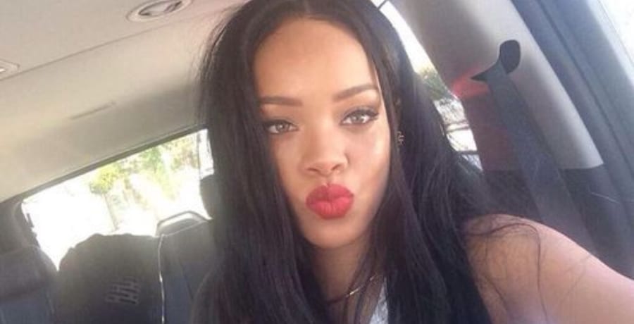 Rihanna Pouts Red Lips [Source: Rihanna - Instagram]