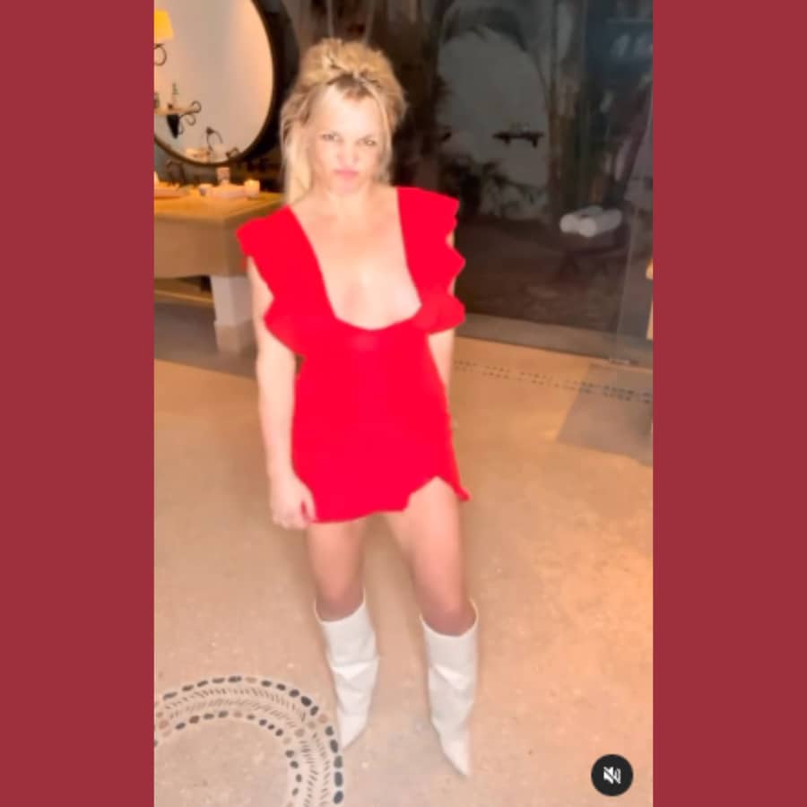 Britney Spears Dances In Red Plunging Dress [Source: Britney Spears - Instagram]
