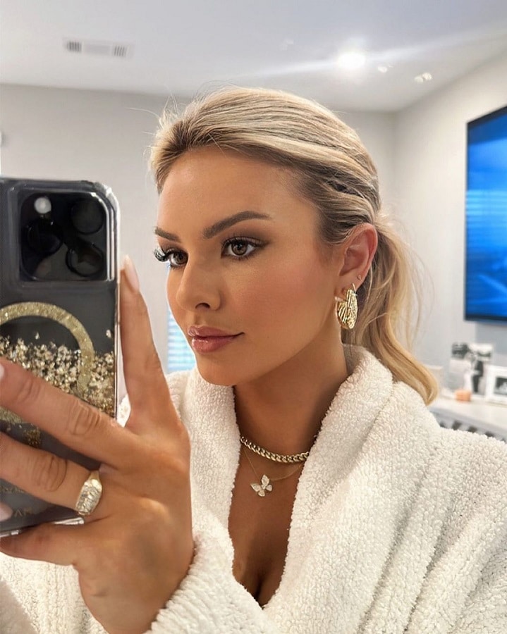 Emmy Medders Glam In White Robe [Source: Emmy Medders - Instagram]