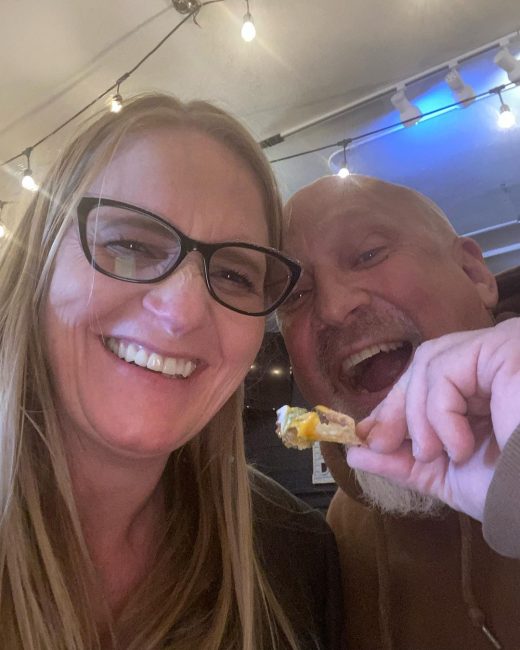 Christine and David Woolley eating nachos [Source: David's Instagram]