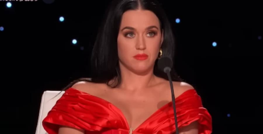 Katy Perry Wears Red Off-Shoulder Dress [Source: YouTube]