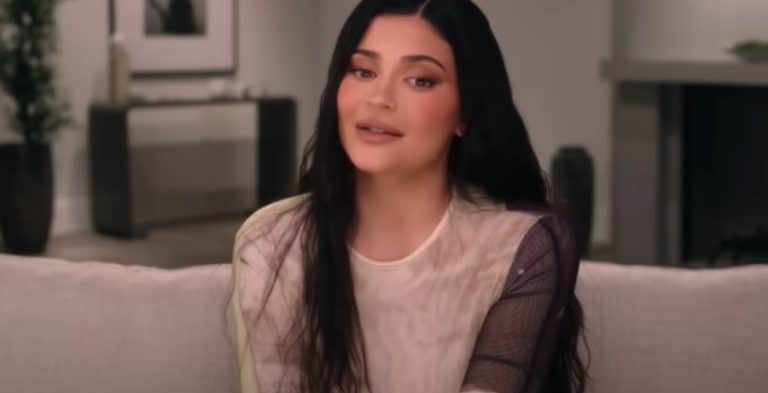 Kylie Jenner Tugs Down Denim Skirt, Flashes Flat Tummy