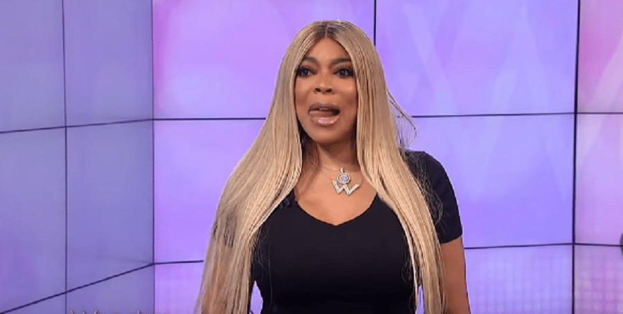 Wendy Williams Lick Lips In Blonde Wig [Source: YouTube]