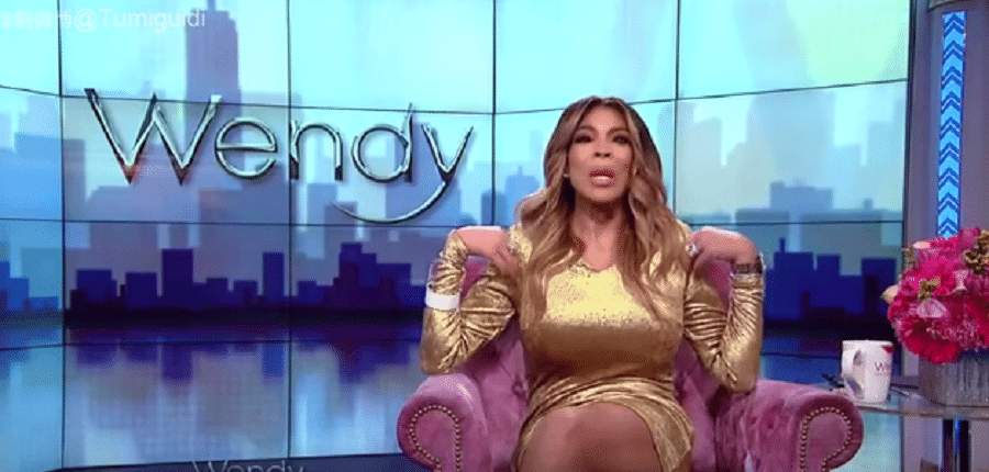 Wendy Williams Sits In Gold Dress [Source: YouTube]