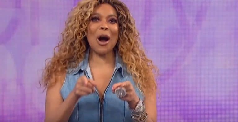 Wendy Williams Rocks Curly Wig & Denim Jumpsuit [Source: YouTube]