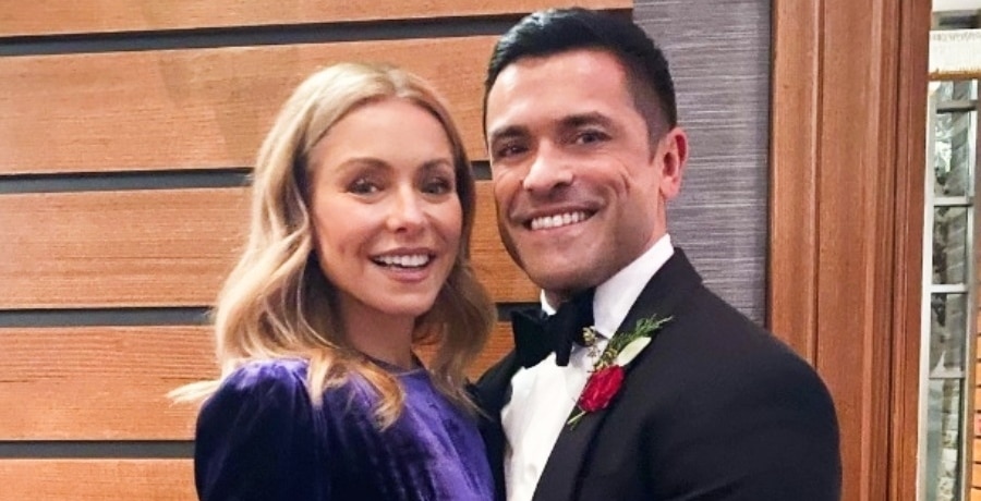 Kelly Ripa smiling with her husband Mark