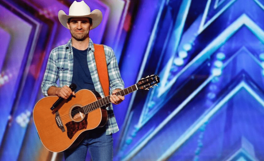 Mitch Rossell performs on stage on America's Got Talent.