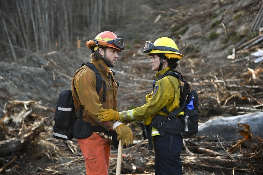 Fire Country Pictured (L-R): Max Thieriot as Bode Donovan and Stephanie Arcila as Gabriela Perez. Photo: Sergei Bachlakov/CBS ©2023 CBS Broadcasting, Inc. All Rights Reserved.