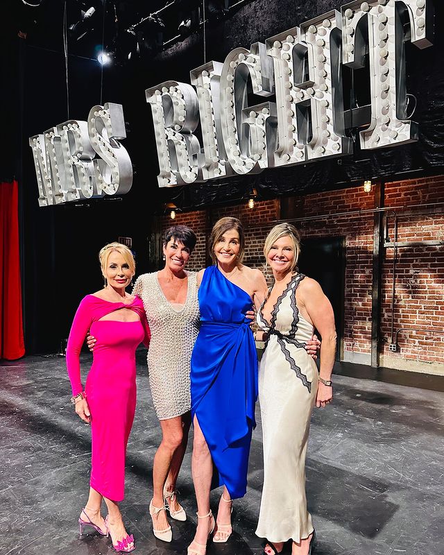Four older women in beautiful gowns in front of a sign that says "MRS RIGHT"