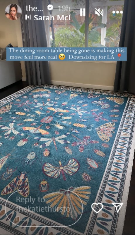 A blue and white patterned rug