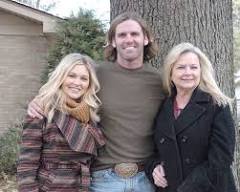 Sarah and Ty Ferrell with Sarah's mother. - Facebook