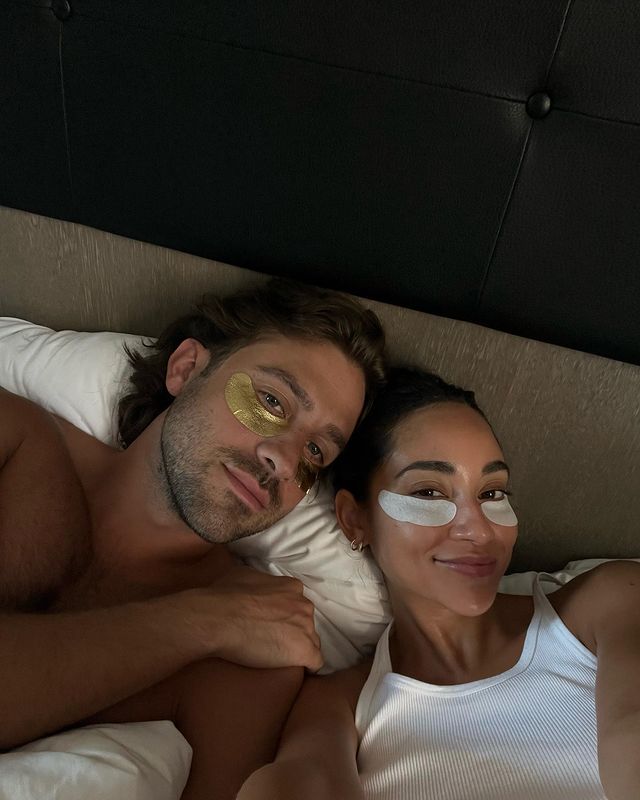 A man and a woman with eye masks under their eyes