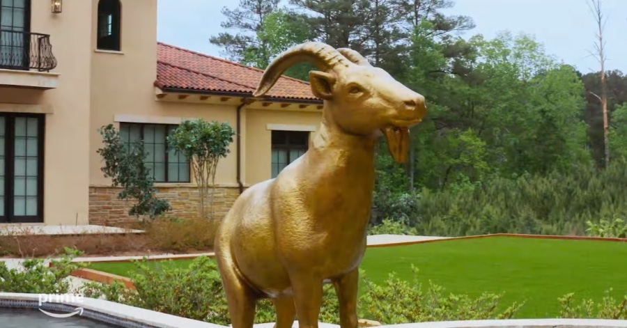 The golden goat outside The GOAT manor. - YouTube