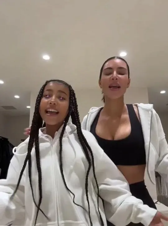 North West and Kim Kardashian dance and sing to Taylor Swift's "Shake It Off." - TikTok