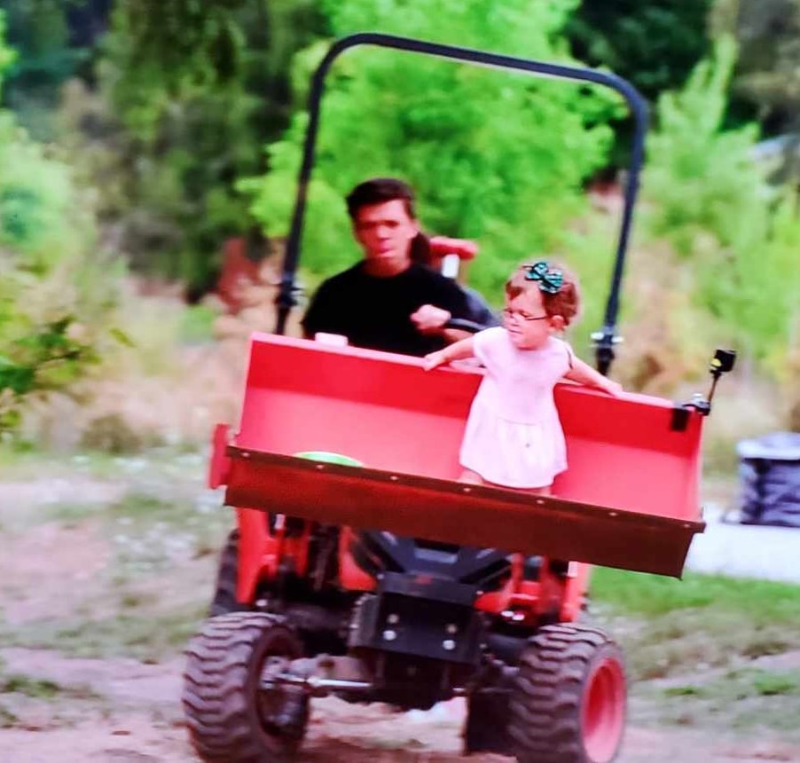 Zach and Lilah Roloff tractor