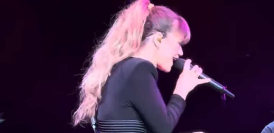 Her long ponytail causes a wardrobe malfunction - YouTube