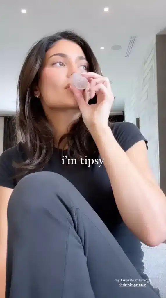 Kylie Jenner getting drunk on the job. - Instagram