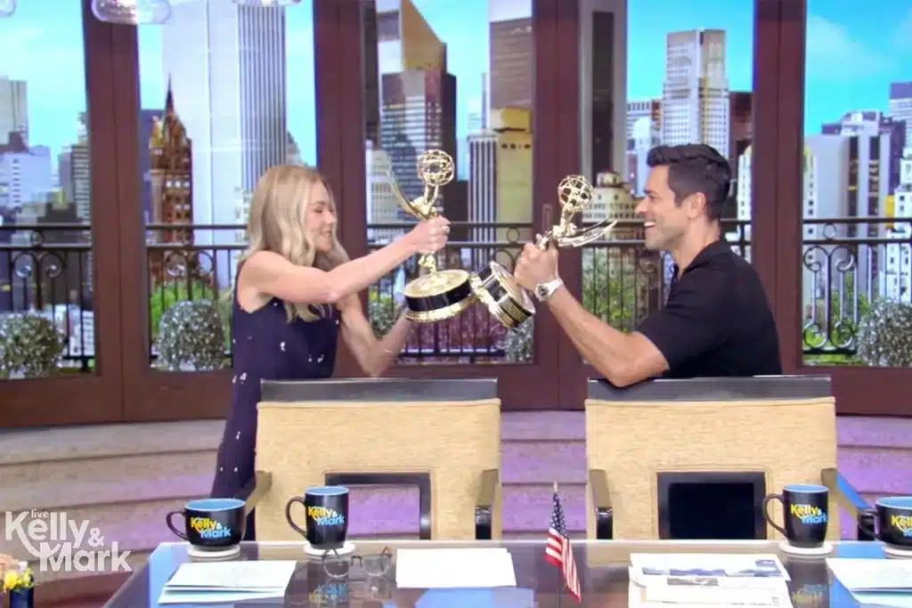 Kelly Ripa and Mark Consuelos celebrate winning a Daytime Emmy together. - Live
