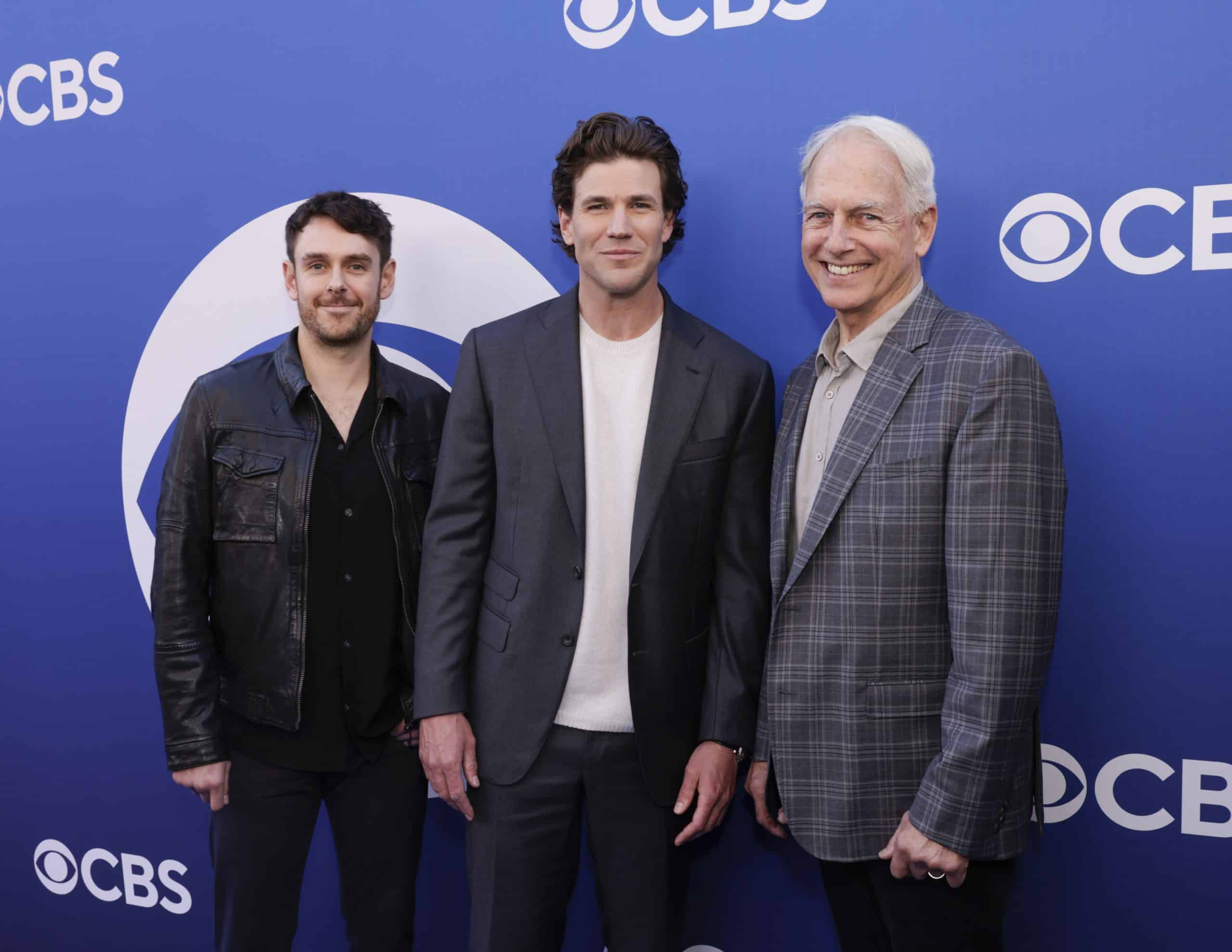 Executive Producer Sean Harmon, Austin Stowell and Executive Producer Mark Harmon from ’NCIS: Origins’ attend the CBS New Fall Schedule Celebration event to announce CBS' 2024-2025 primetime lineup at Paramount Studios in Los Angeles on May 2, 2024. The primetime programming lineup of CBS Originals features three new dramas, two new comedies, a new alternative series, a reimagined classic game show, special event programming and 18 returning series.  -- Photo: Francis Specker/CBS ©2024 CBS Broadcasting, Inc. All Rights Reserved.