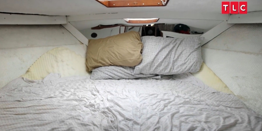 Larger bed at the front of the boat. - Welcome To Plathville